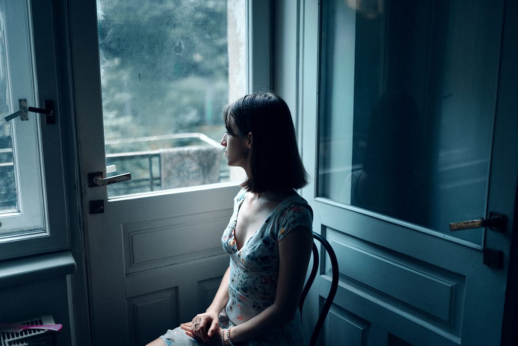 lady thinking from anxiety and intrusive thoughts