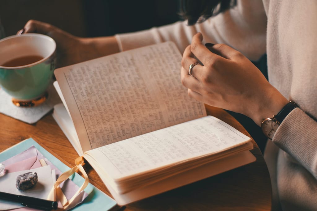 writing journal with tea