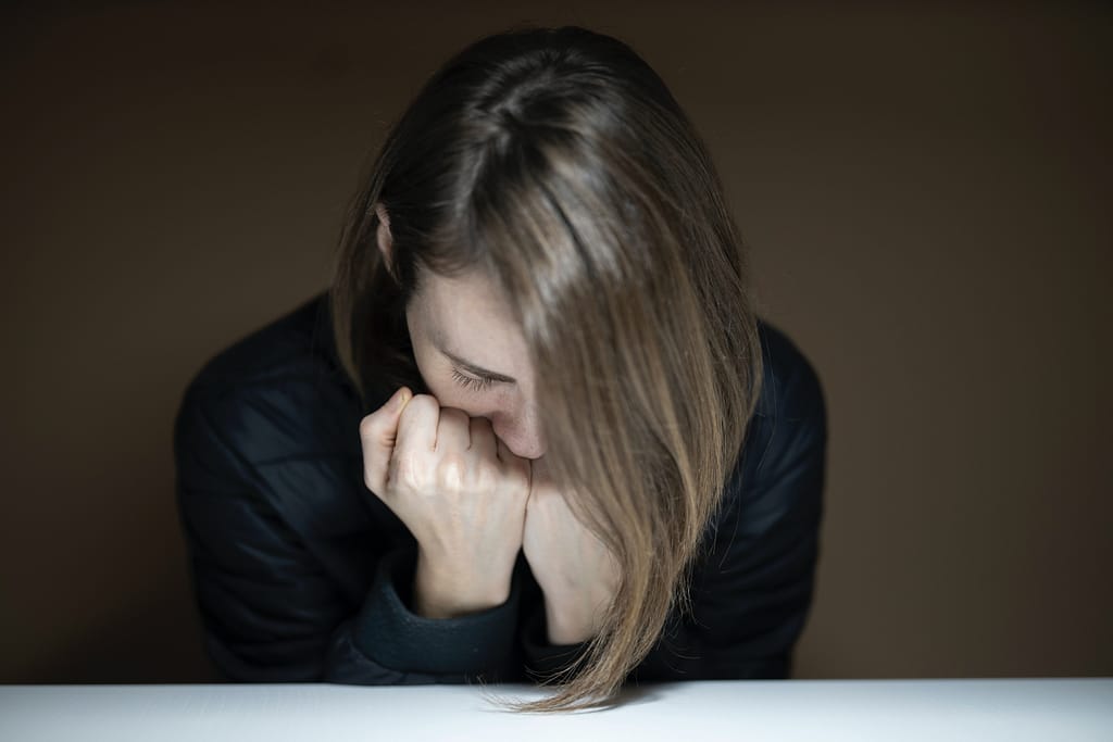 lady stressed over intrusive thoughts